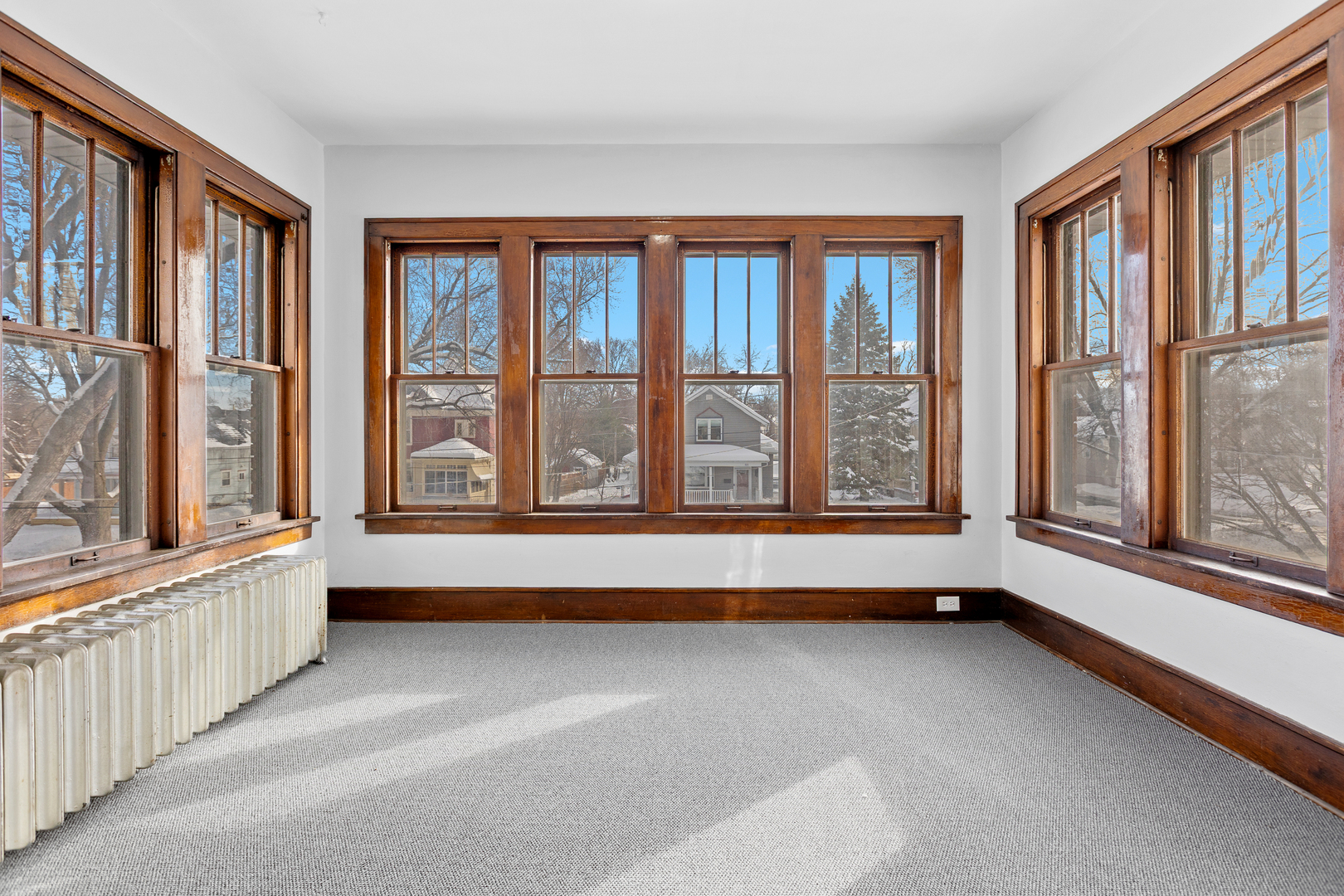 518 South Street Elgin, IL 60123 - Photo 5 of 22 a view of an empty room with a window