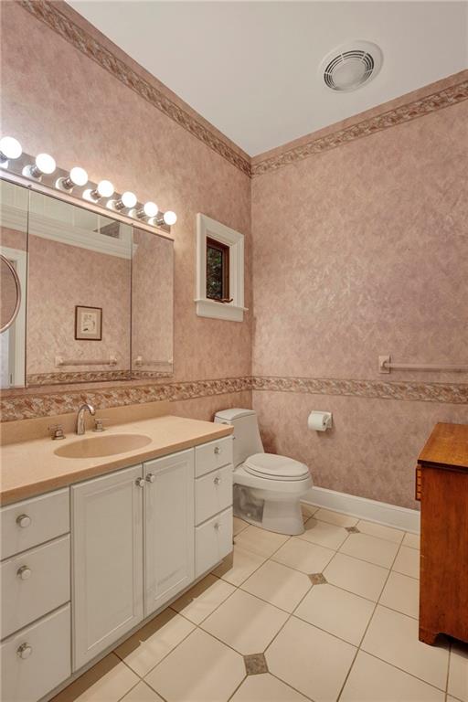 274 Rector Road Rector, PA 15677 - Photo 33 of 50 a bathroom with a toilet sink and mirror