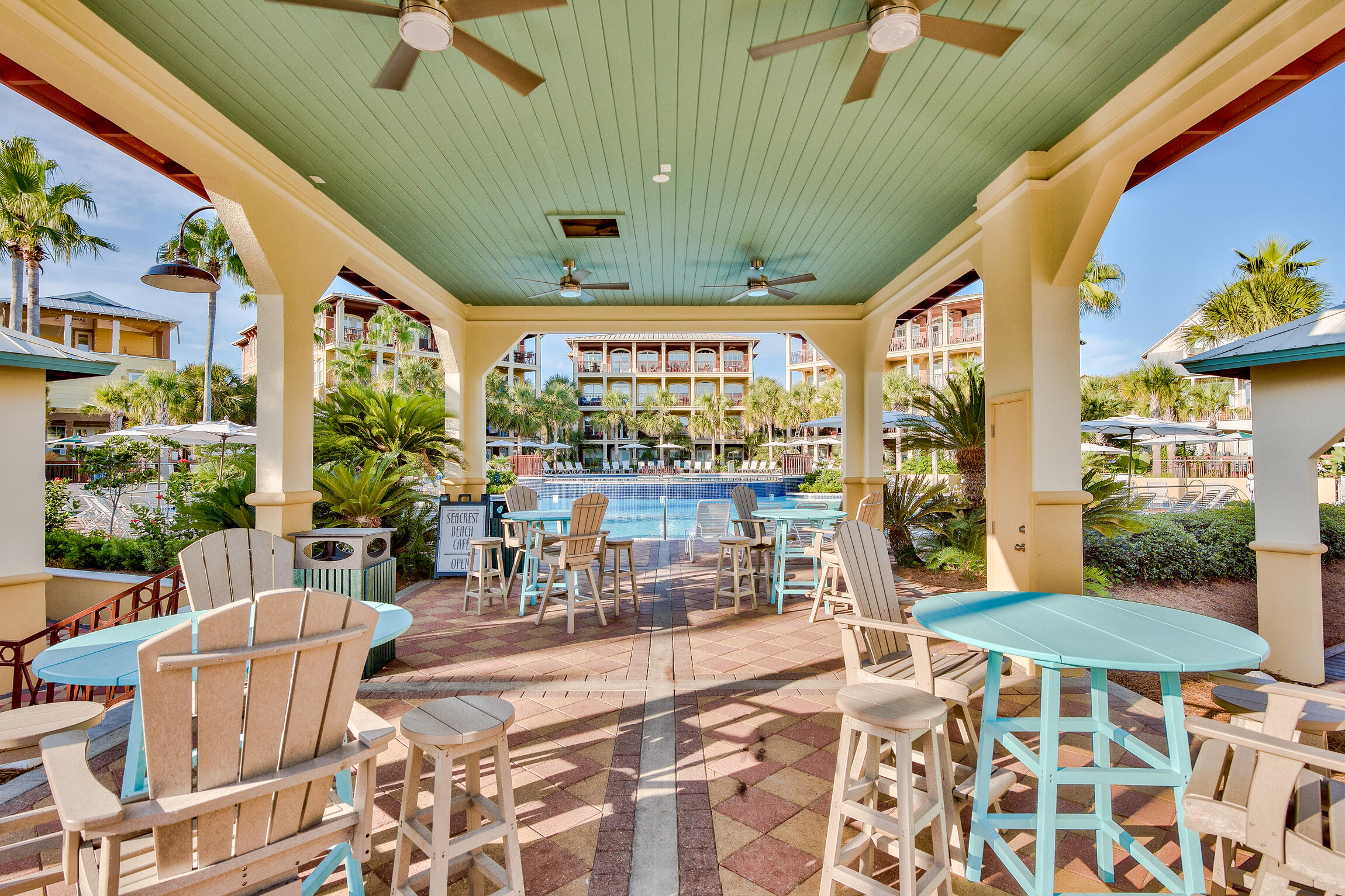 228 Beach Bike Way Inlet Beach, FL 32461 - Photo 13 of 17 a building outdoor space with patio furniture and potted plants