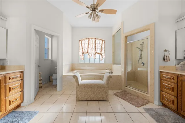 a bedroom with a bed and a table