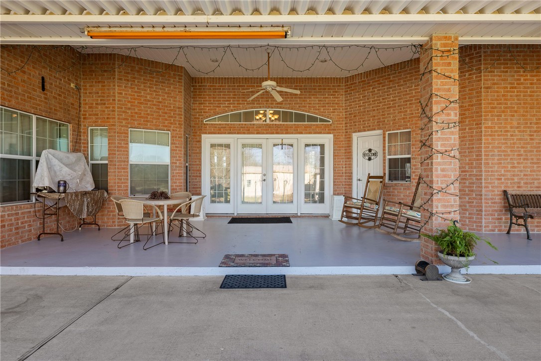 128 Duke Road Bedias, TX 77831 - Photo 7 of 49 a living room with furniture and a fireplace
