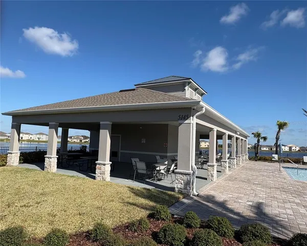 a view of a house with a swimming pool