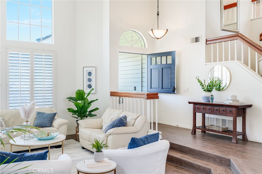 5 Lindall Street Laguna Niguel, CA 92677 - Photo 1 of 45 a living room with furniture and wooden floor