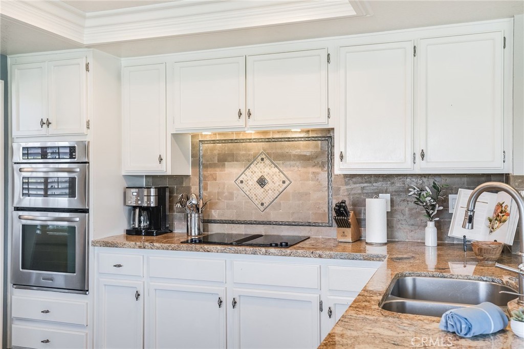 5 Lindall Street Laguna Niguel, CA 92677 - Photo 13 of 45 a kitchen with appliances and cabinets