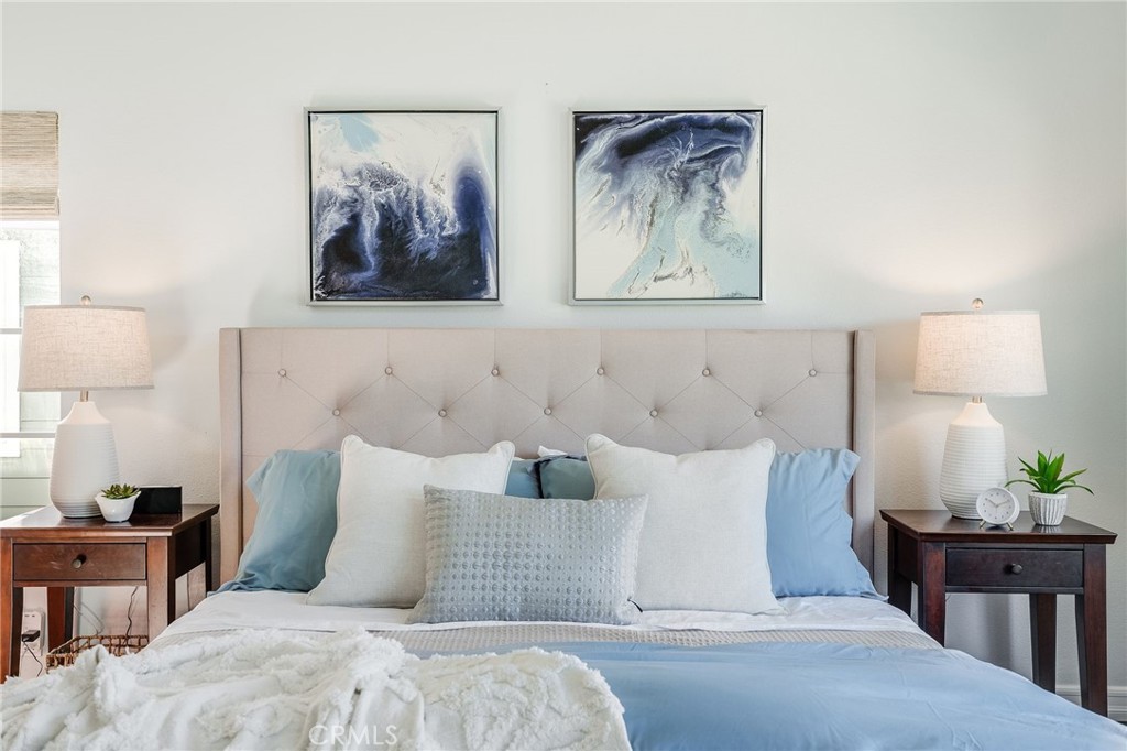 5 Lindall Street Laguna Niguel, CA 92677 - Photo 21 of 45 a bedroom with bed and painting on the wall