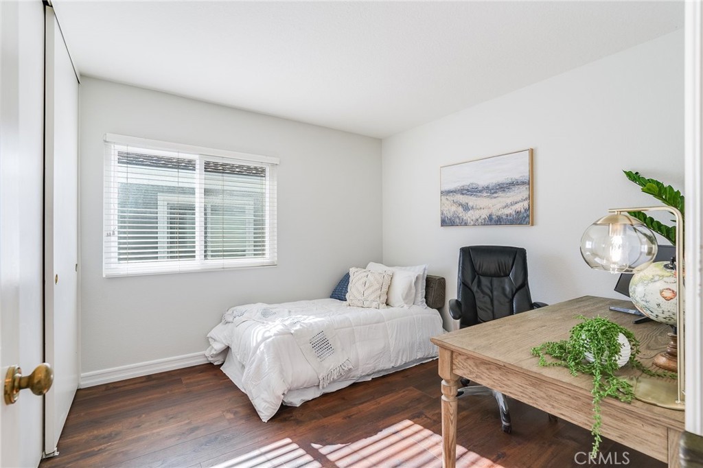 5 Lindall Street Laguna Niguel, CA 92677 - Photo 25 of 45 a bedroom with a bed table and chair