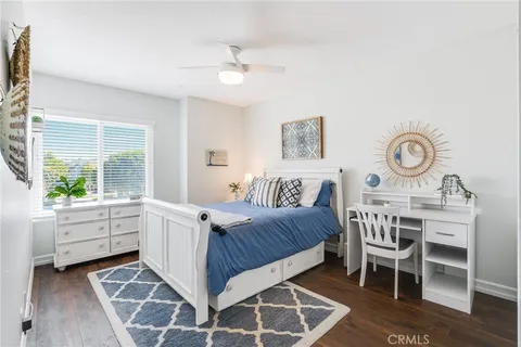 a bed room with a bed and a table