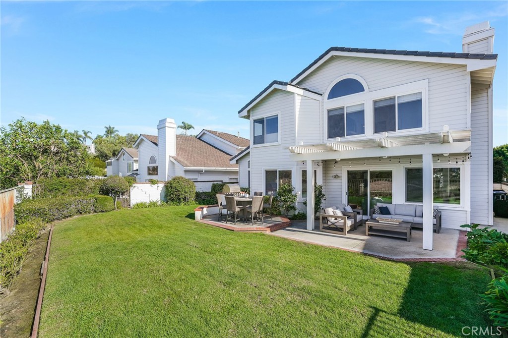 5 Lindall Street Laguna Niguel, CA 92677 - Photo 33 of 45 a front view of a house with sitting area and garden