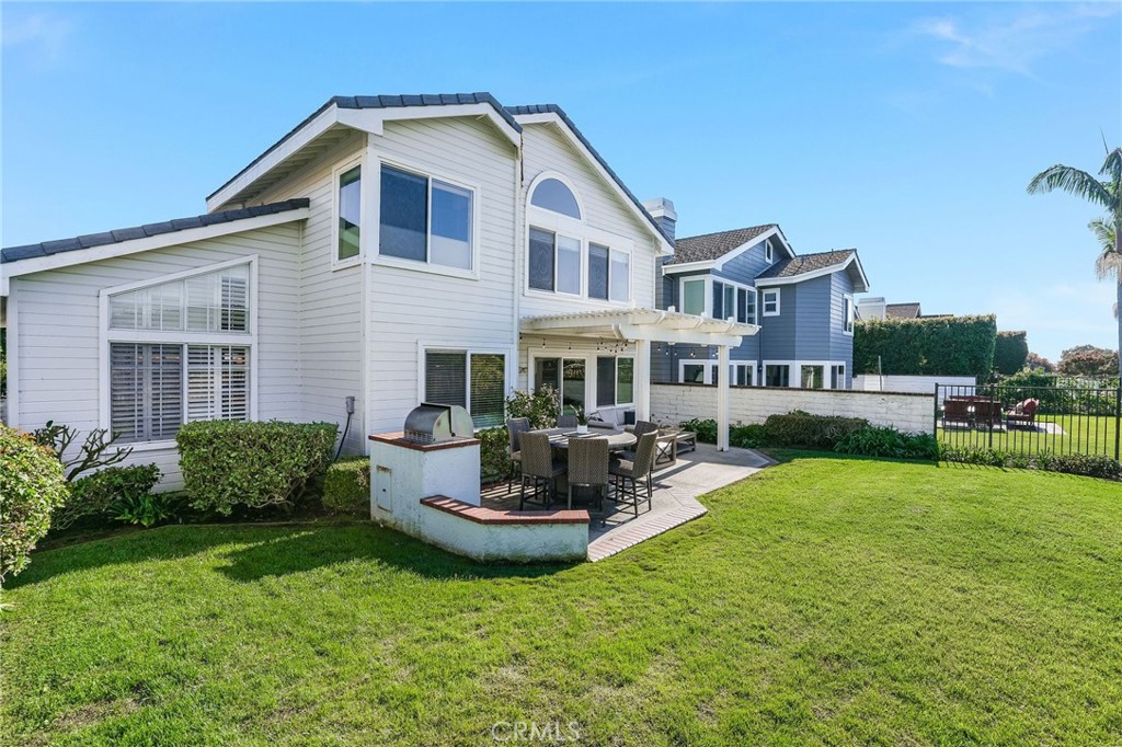5 Lindall Street Laguna Niguel, CA 92677 - Photo 35 of 45 a view of a house with backyard sitting area and garden