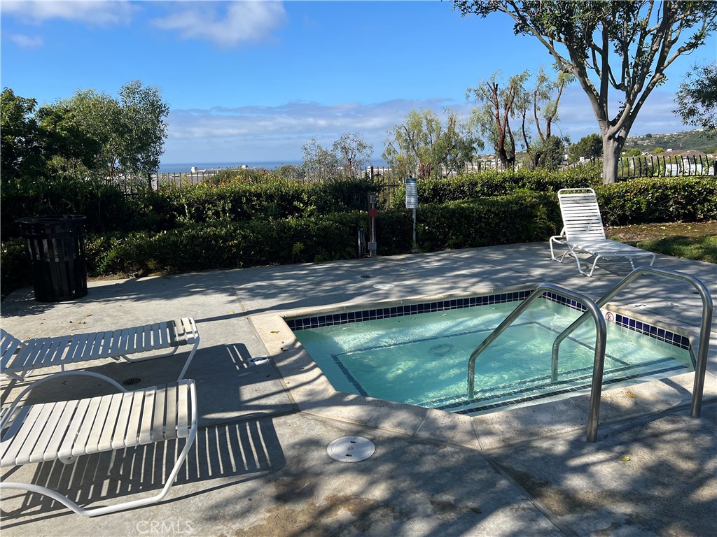 5 Lindall Street Laguna Niguel, CA 92677 - Photo 43 of 45 a view of swimming pool with two chairs and a table