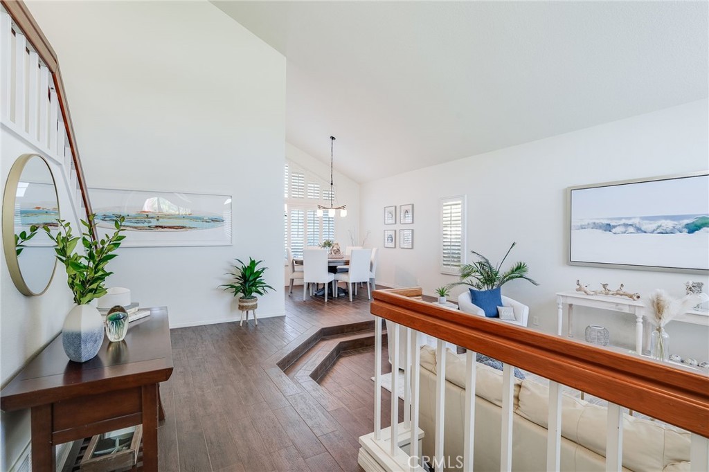5 Lindall Street Laguna Niguel, CA 92677 - Photo 5 of 45 a living room with furniture a potted plant and open kitchen view