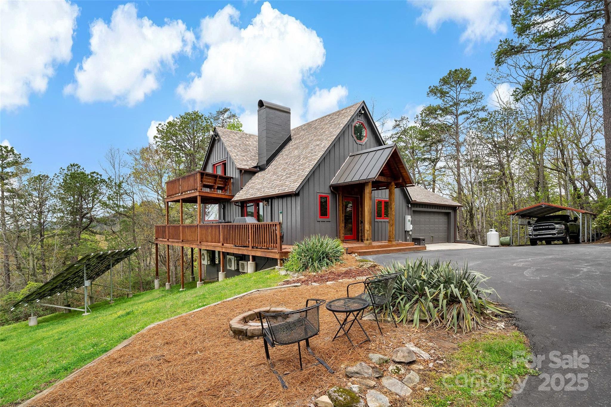 692 Hidden Acres Drive Marion, NC 28752 - Photo 3 of 48 a view of a house with a yard