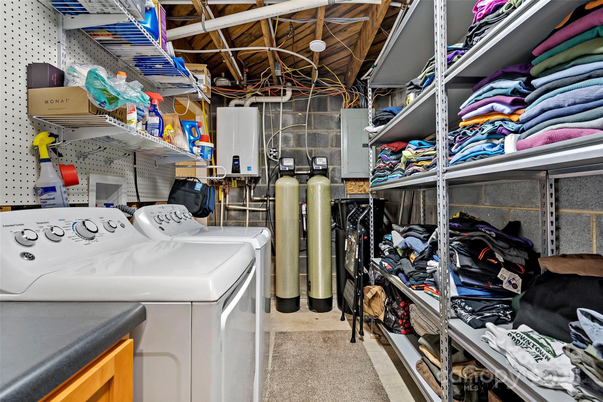 692 Hidden Acres Drive Marion, NC 28752 - Photo 36 of 48 a utility room with lots of stuff