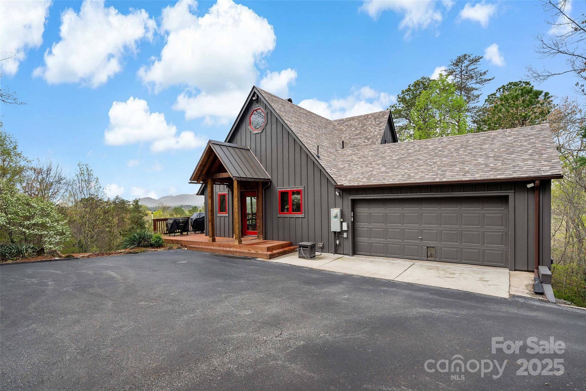 692 Hidden Acres Drive Marion, NC 28752 - Photo 4 of 48 a view of a house with porch