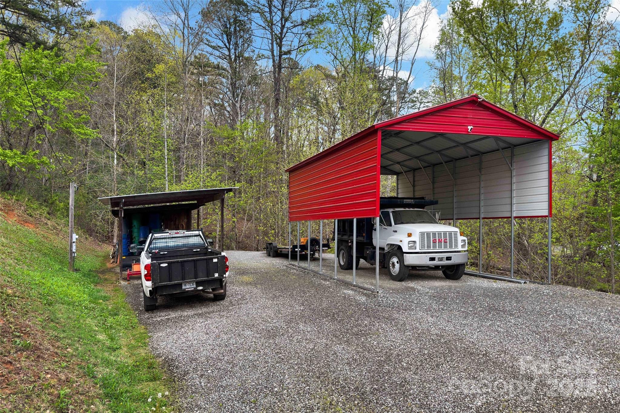 692 Hidden Acres Drive Marion, NC 28752 - Photo 41 of 48 a car parked in front of house