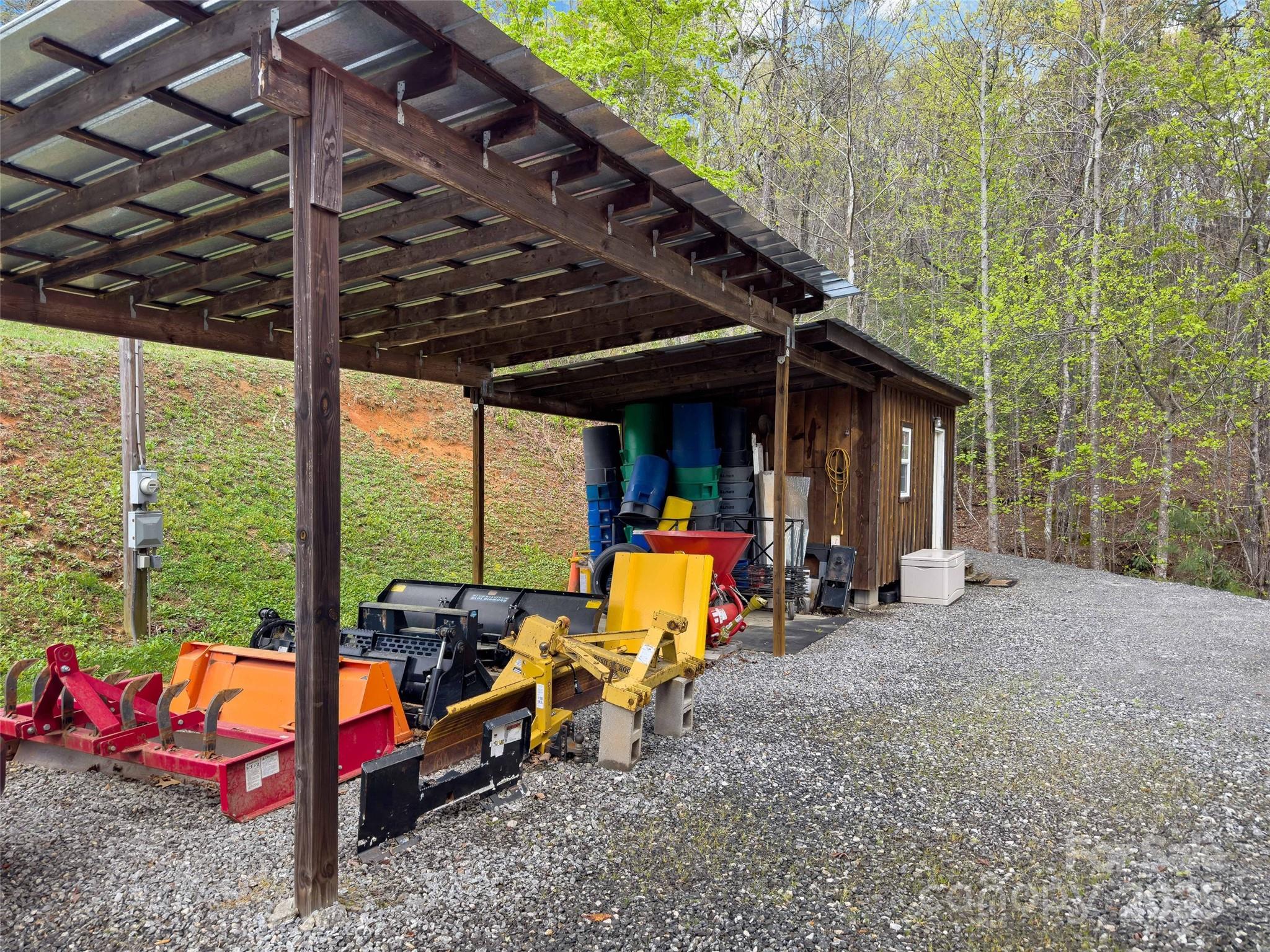 692 Hidden Acres Drive Marion, NC 28752 - Photo 42 of 48 a view of chairs and tables in the patio