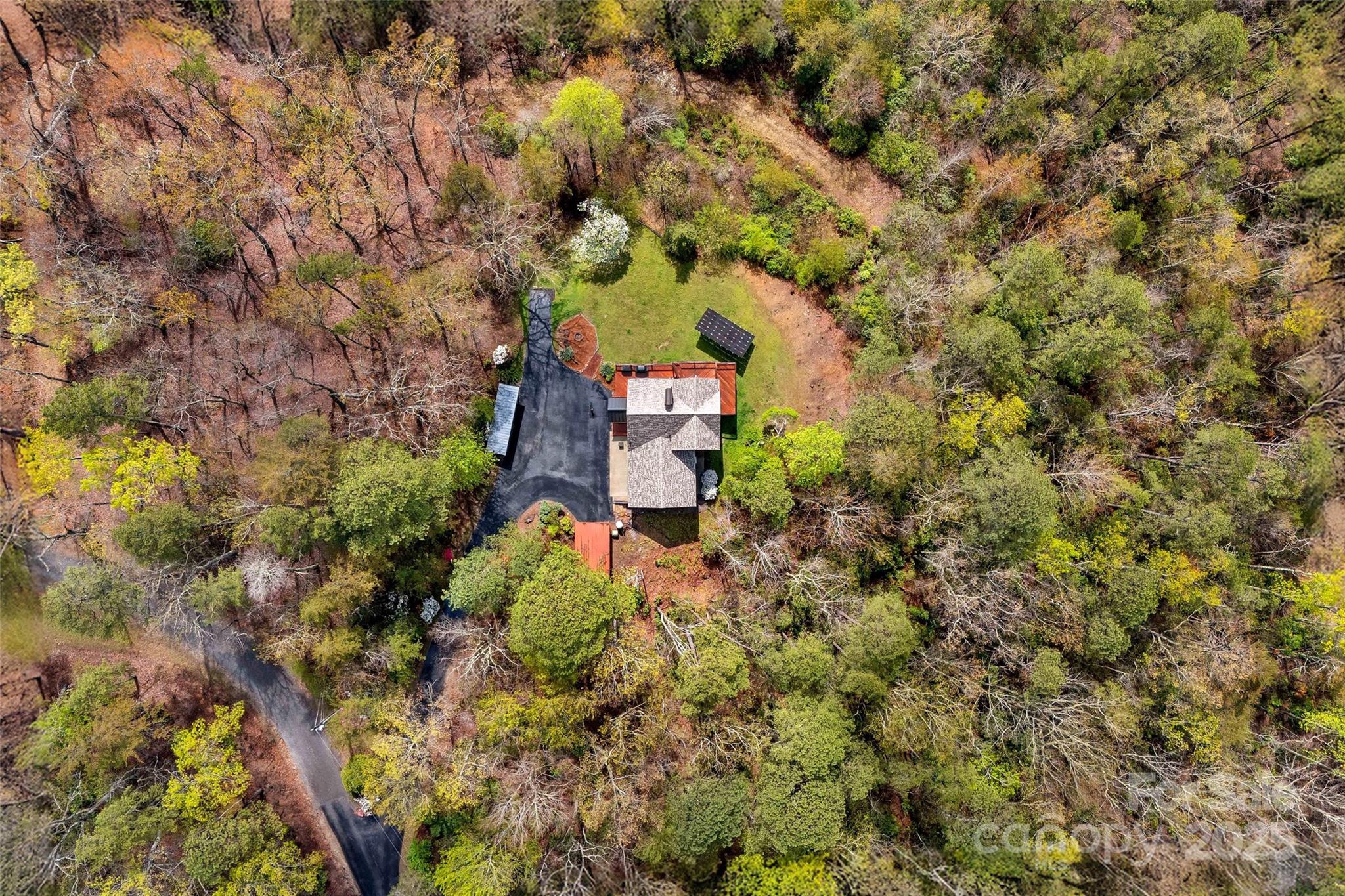 692 Hidden Acres Drive Marion, NC 28752 - Photo 43 of 48 a view of a house with a tree