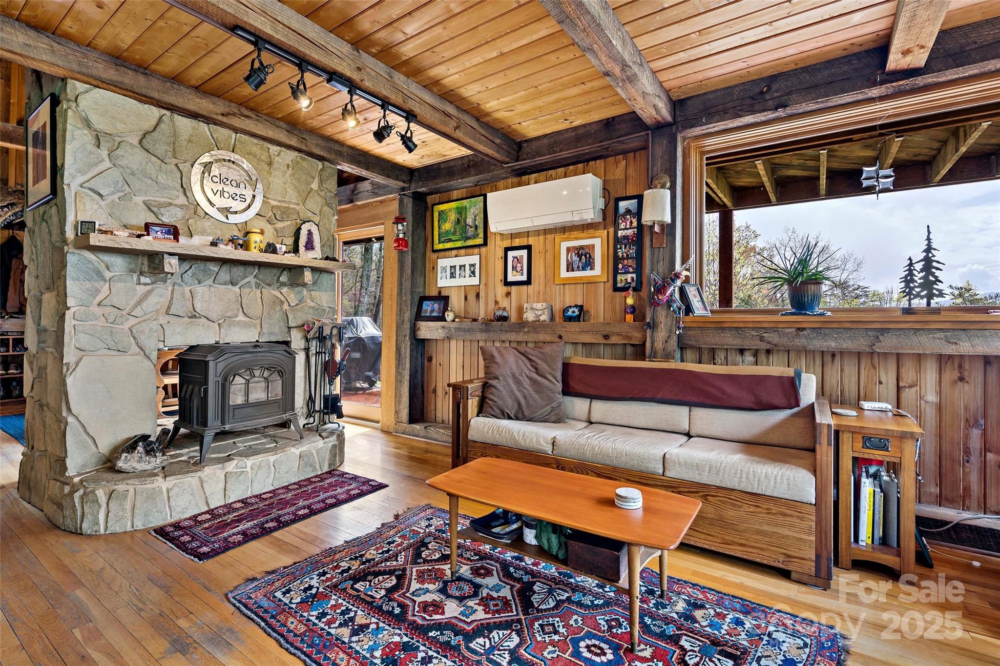 692 Hidden Acres Drive Marion, NC 28752 - Photo 8 of 48 a outdoor living area with furniture and a fireplace