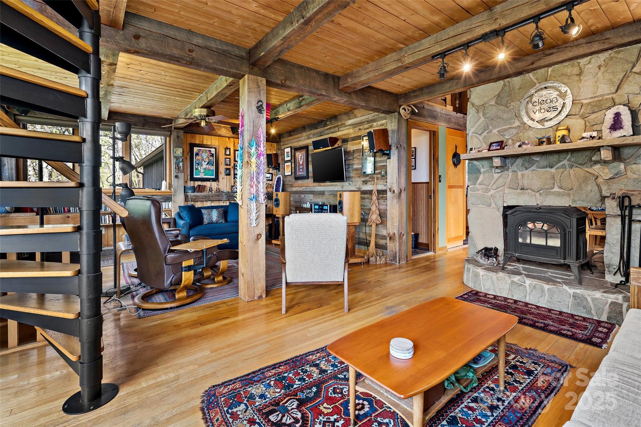 692 Hidden Acres Drive Marion, NC 28752 - Photo 9 of 48 a living room with furniture and a fireplace