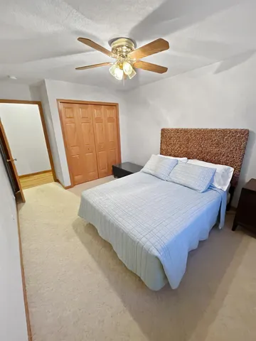 a living room with a fireplace and a fireplace