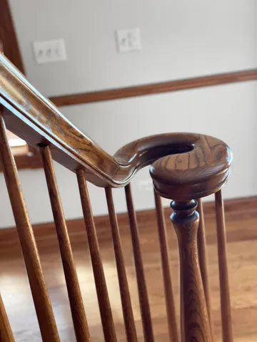 a bedroom with a bed and chair