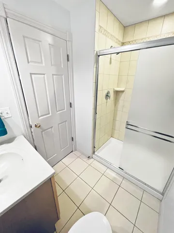 a view of deck with a large tree and wooden floor