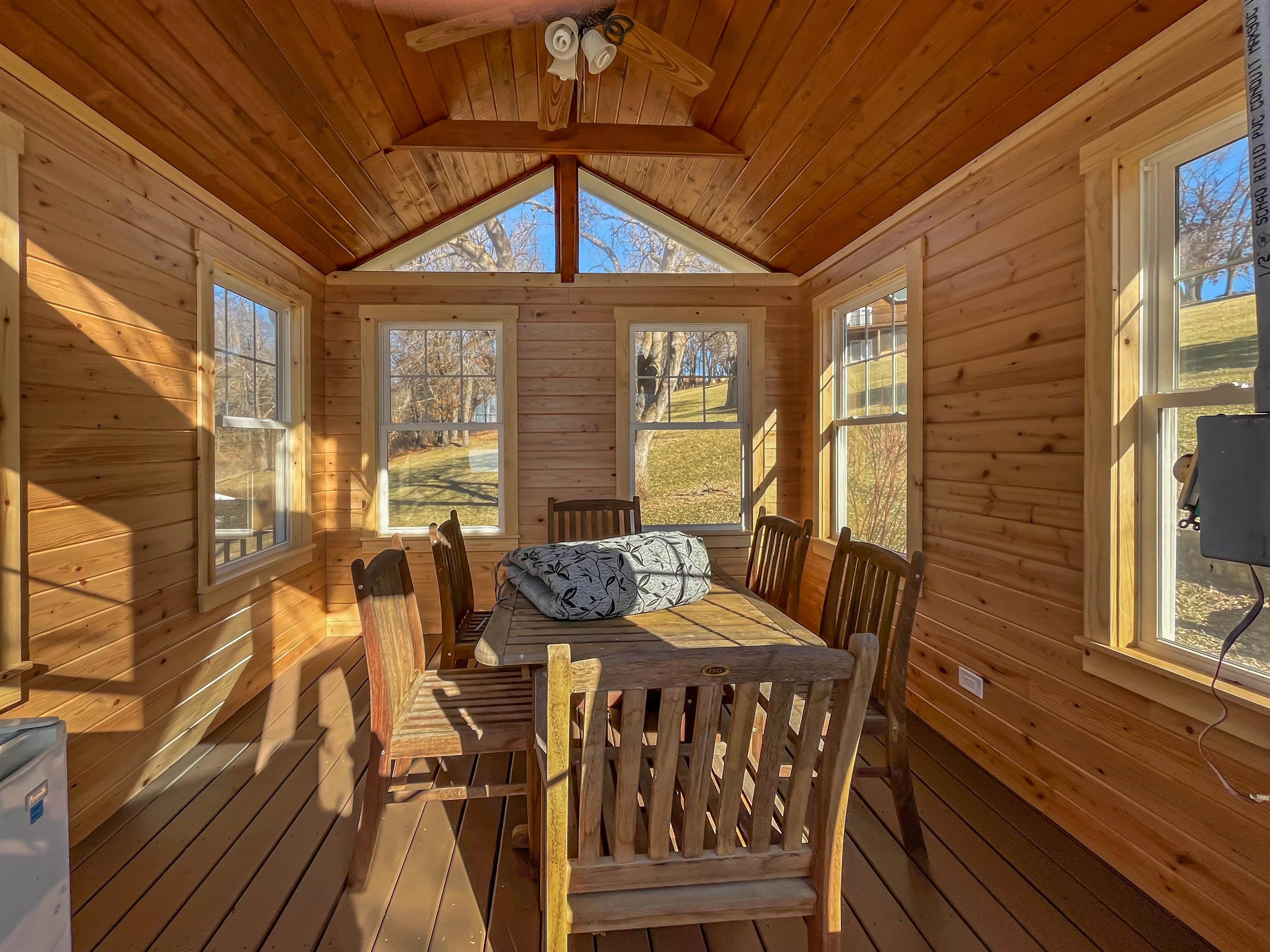 27-54 Ridgeview Drive Lake Carroll, IL 61046 - Photo 43 of 58 a view of a patio with a table and chairs