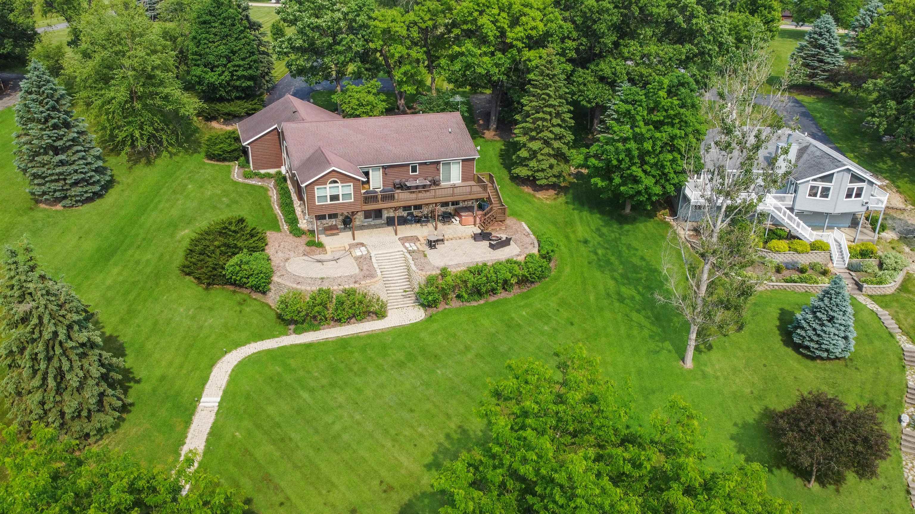 27-54 Ridgeview Drive Lake Carroll, IL 61046 - Photo 53 of 58 an aerial view of a house with garden space trees and houses