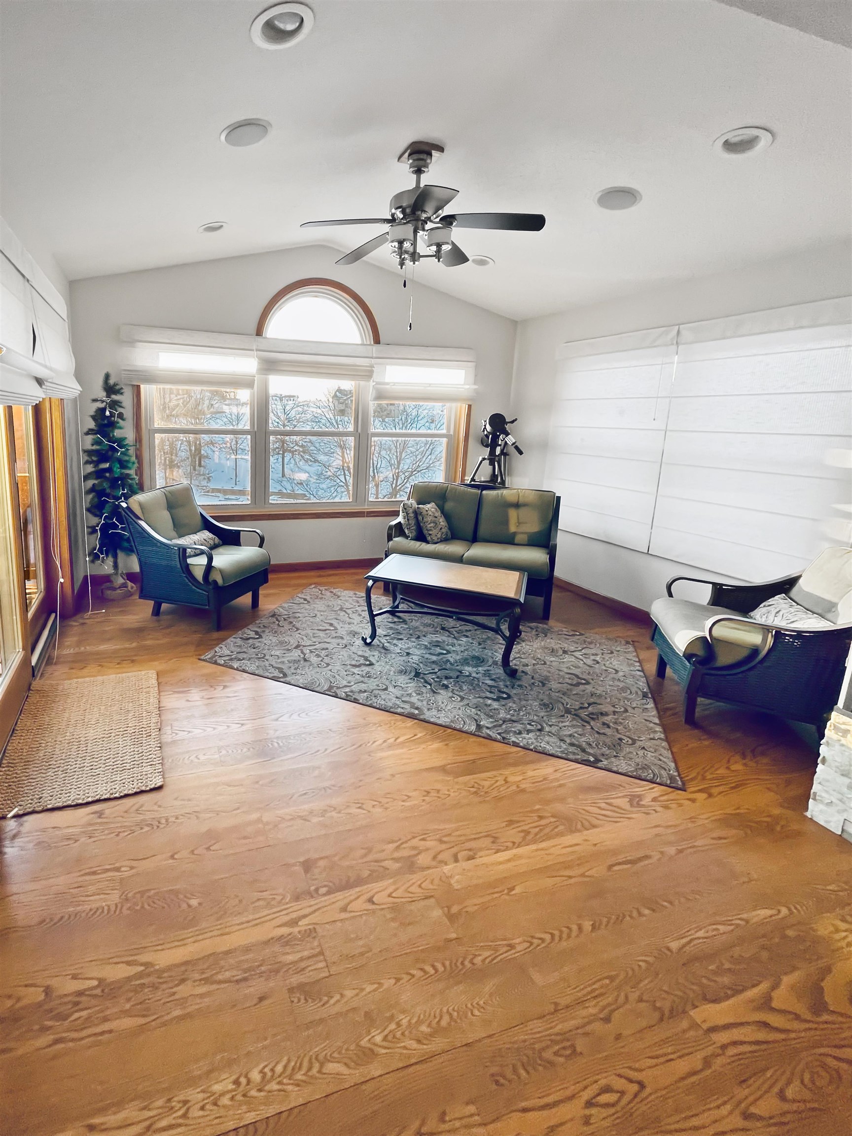 27-54 Ridgeview Drive Lake Carroll, IL 61046 - Photo 7 of 58 a living room with furniture gym equipment and a rug
