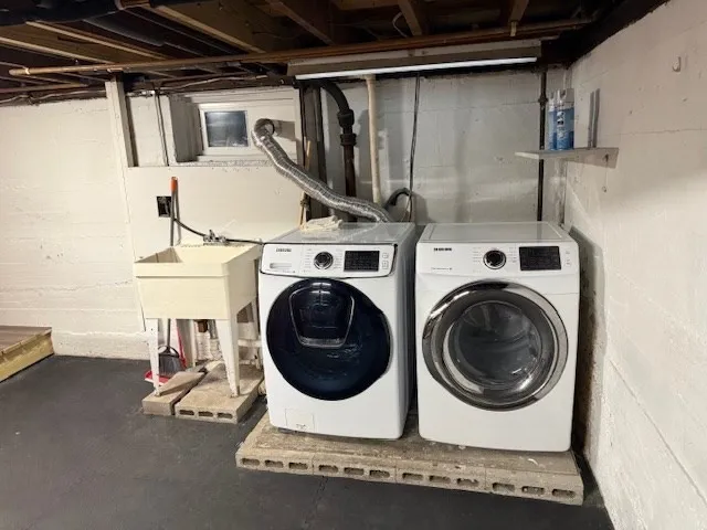 a utility room with dryer and washer