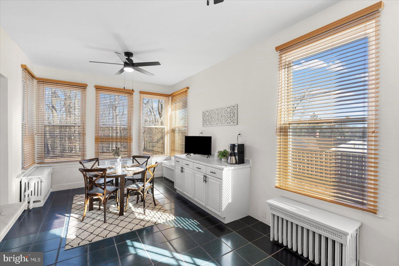6602 Krone Drive Baltimore, MD 21207 - Photo 23 of 49 a view of a dining room with furniture window and outside view