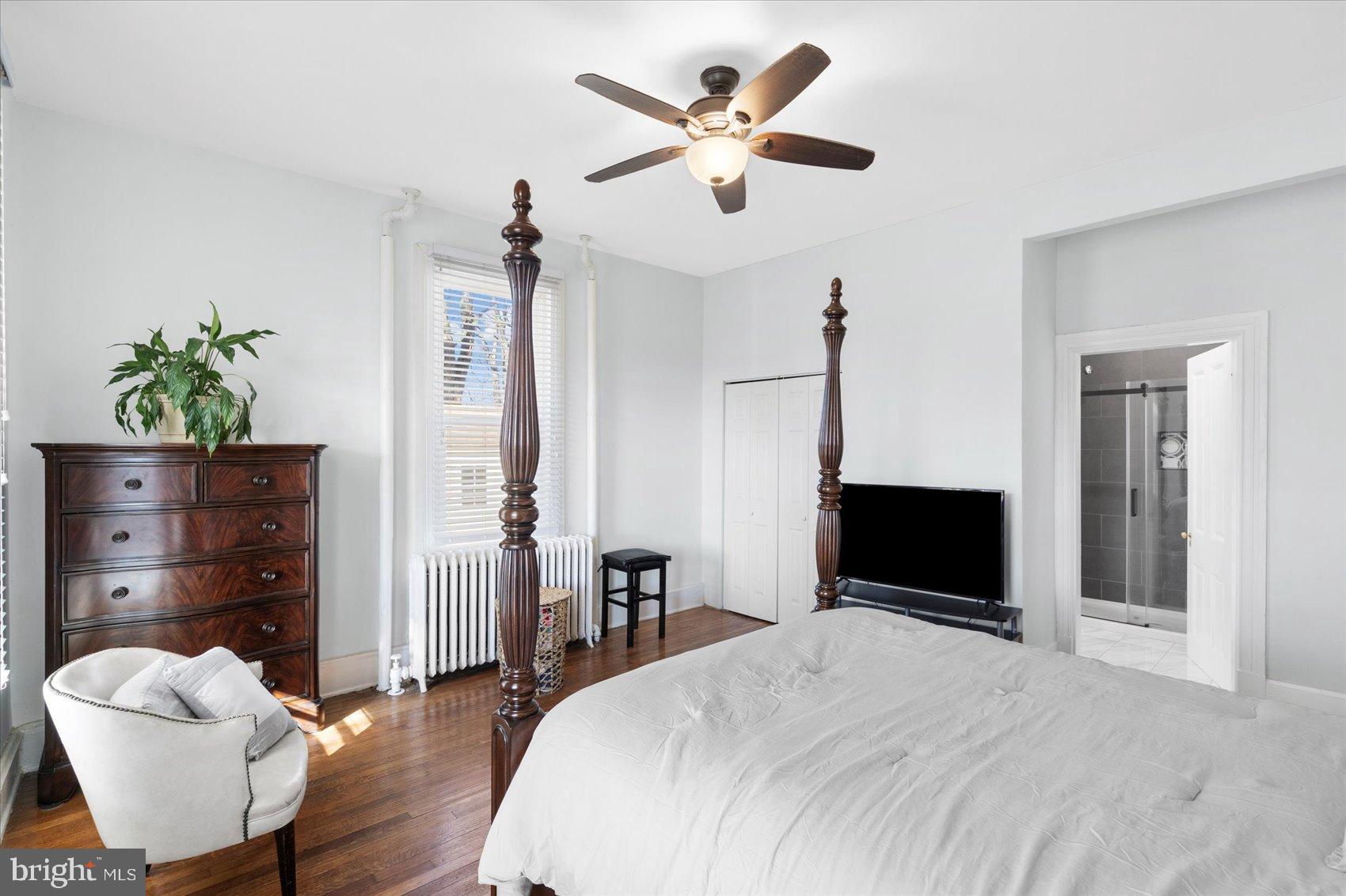 6602 Krone Drive Baltimore, MD 21207 - Photo 25 of 49 a bedroom with a bed and a dresser