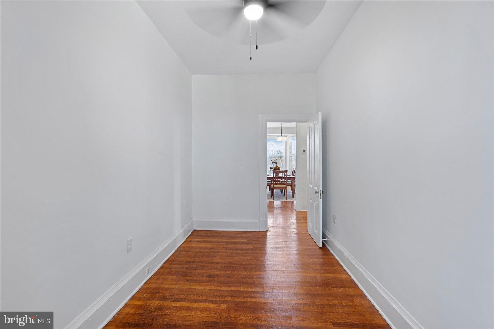 6602 Krone Drive Baltimore, MD 21207 - Photo 29 of 49 a view of a hallway with wooden floor