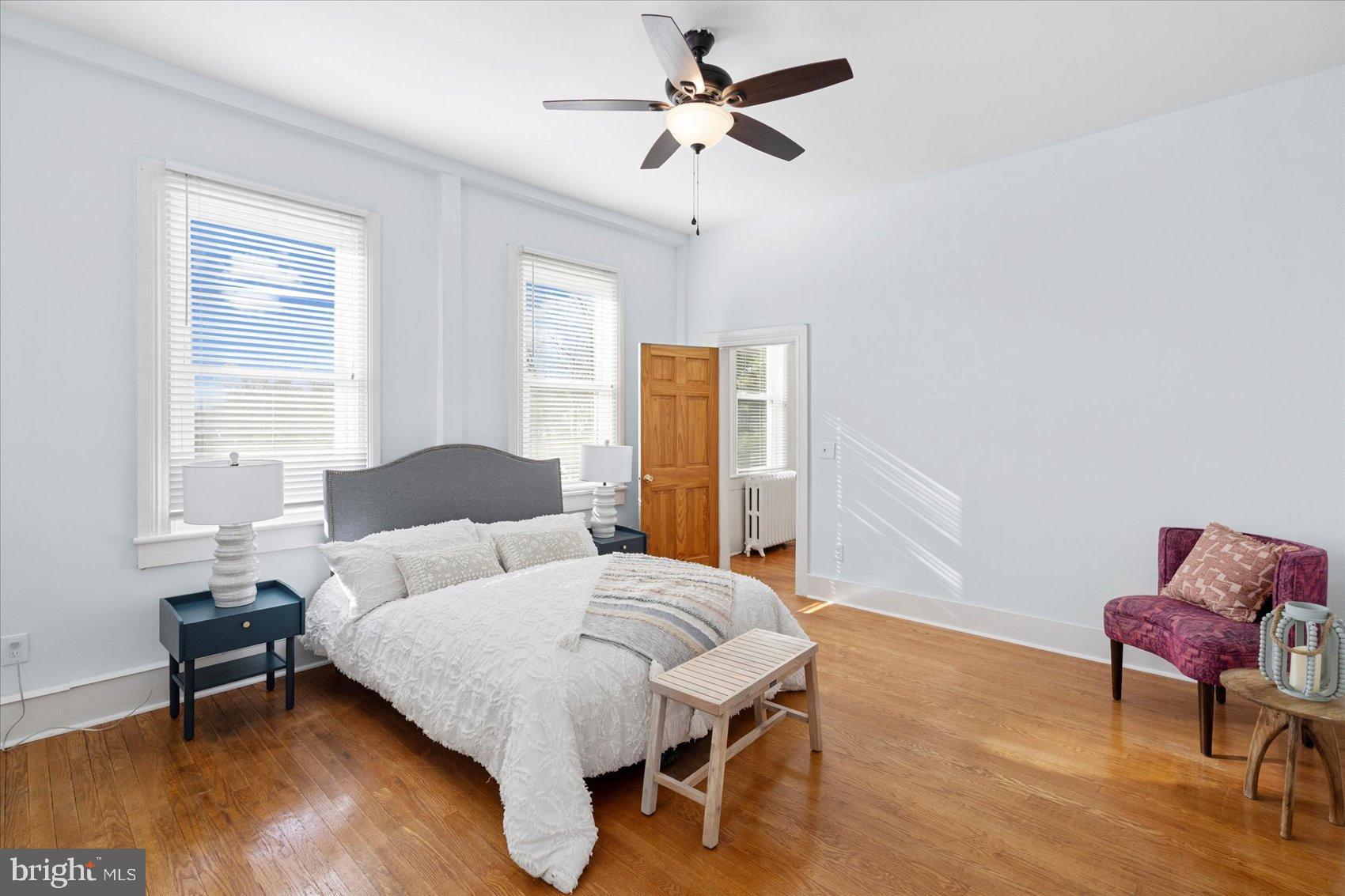 6602 Krone Drive Baltimore, MD 21207 - Photo 41 of 49 a bedroom with a bed and a chair