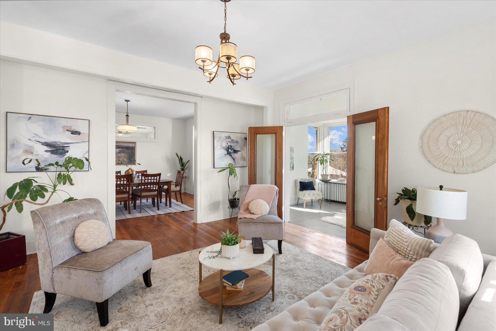 6602 Krone Drive Baltimore, MD 21207 - Photo 10 of 49 a living room with furniture and a chandelier