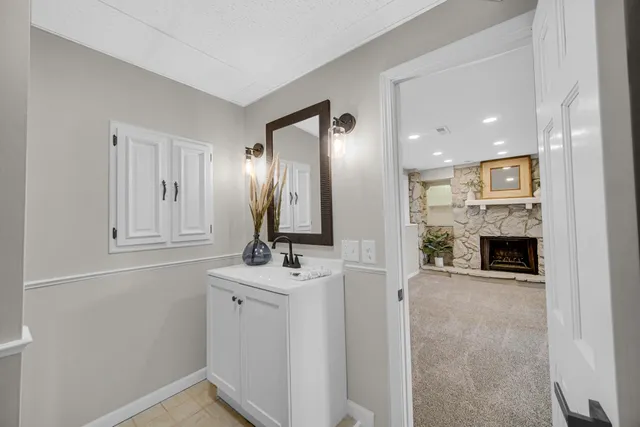 a view of a hallway with washer and dryer