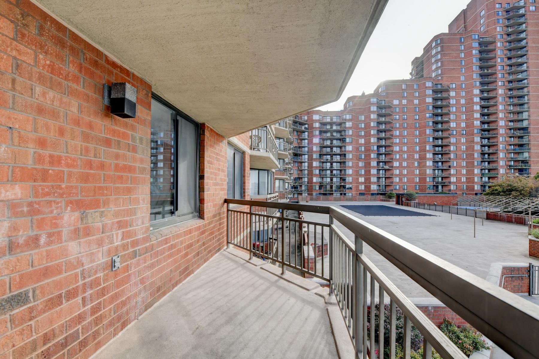 232 Harmon Cove Tower, Unit 232 Secaucus, NJ 07094 - Photo 13 of 47 a view of balcony with couch