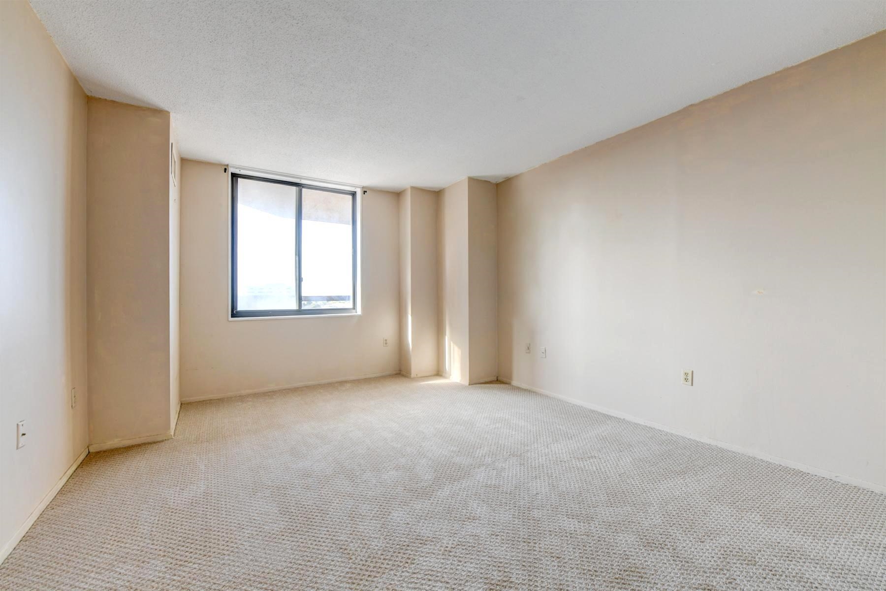232 Harmon Cove Tower, Unit 232 Secaucus, NJ 07094 - Photo 19 of 47 an empty room with windows