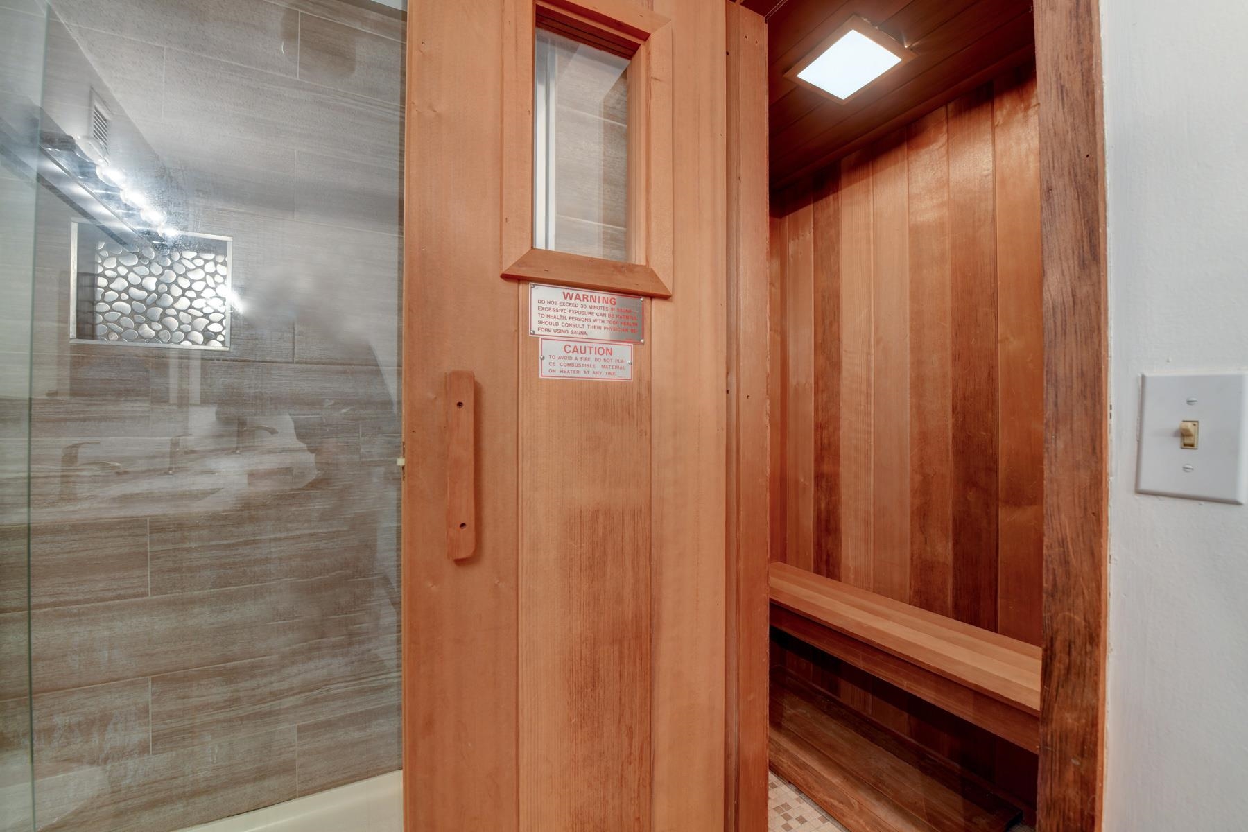 232 Harmon Cove Tower, Unit 232 Secaucus, NJ 07094 - Photo 26 of 47 a bathroom with a shower and a window