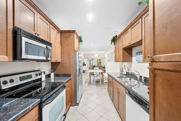 a bedroom with a bed and a tv