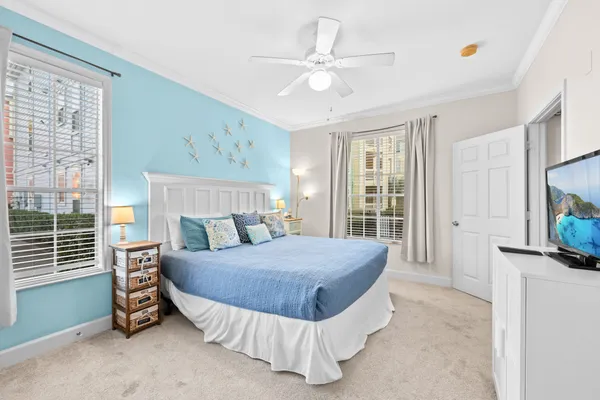 a view of a house with entertaining space and potted plants