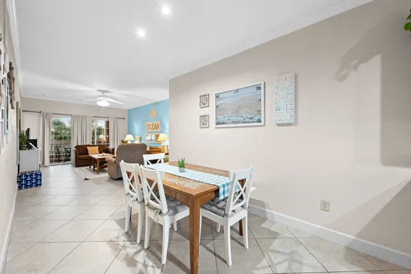 a kitchen with stainless steel appliances granite countertop a refrigerator and a stove