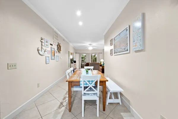 a kitchen with stainless steel appliances a stove a sink and a refrigerator