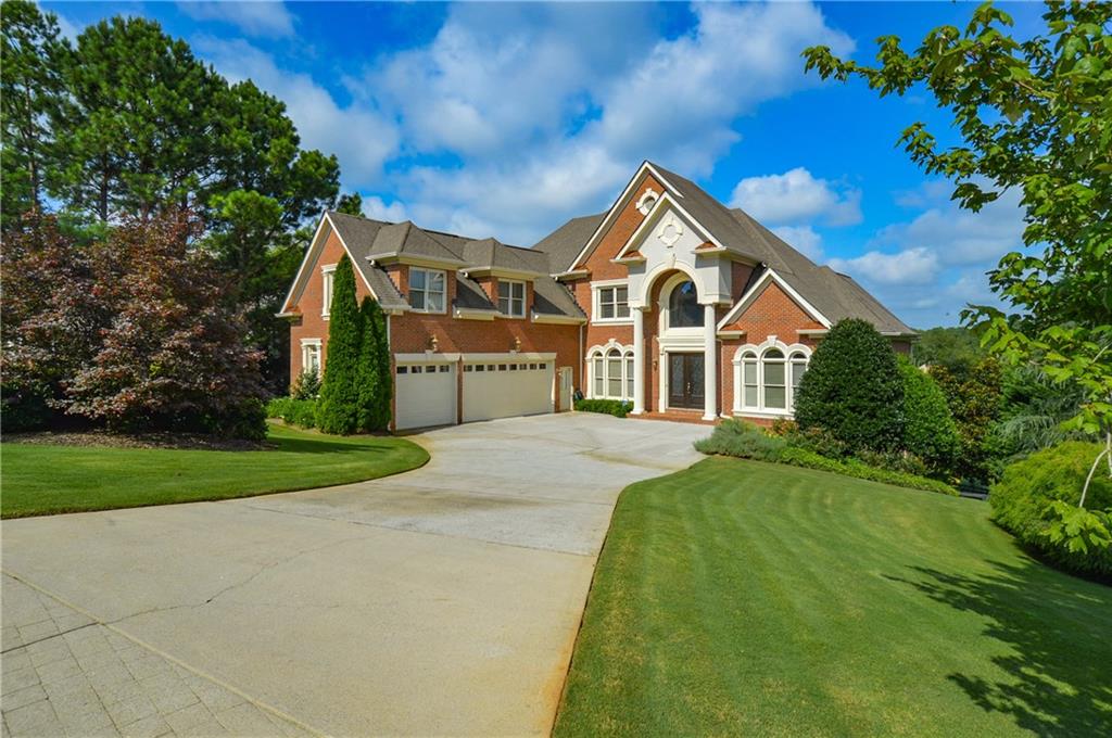 2110 Stoney Point Farm Road Cumming, GA 30041 - Photo 1 of 1 Your guests will be impressed with this elegant courtyard entry and the gorgeous two story entry with fabulous palladium window. Don't miss the elegant leaded glass double front doors.