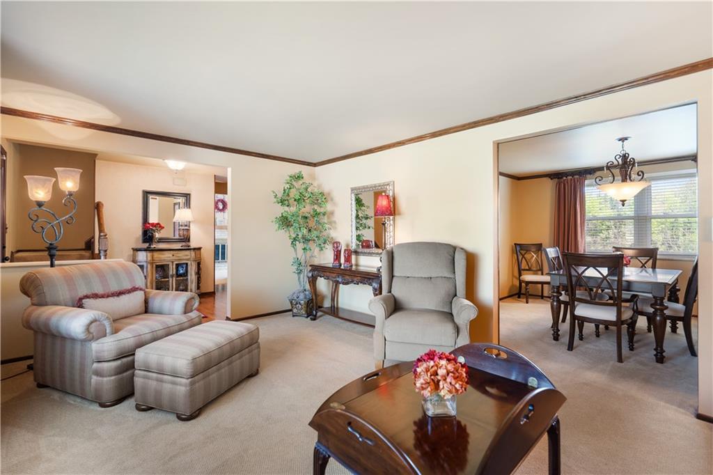 1002 Sundance Drive McKees Rocks, PA 15136 - Photo 6 of 25 a living room with furniture and a large window