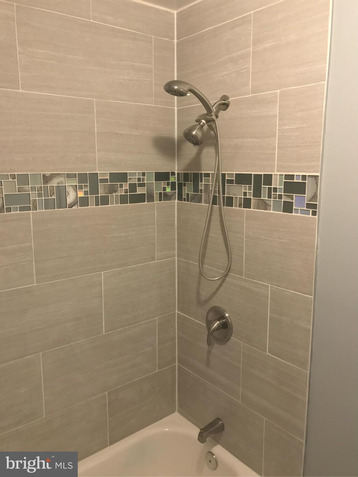 12611 Holdridge Road Silver Spring, MD 20906 - Photo 14 of 21 a bathroom with a shower