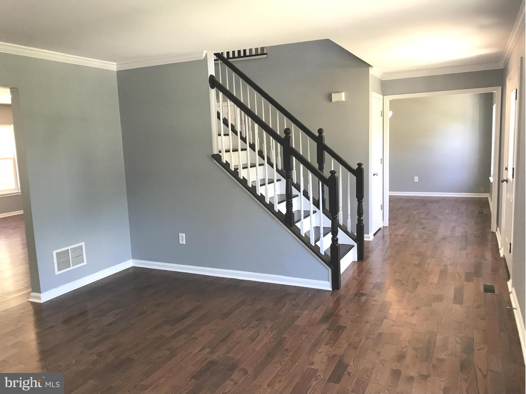 12611 Holdridge Road Silver Spring, MD 20906 - Photo 3 of 21 a view of an entryway with wooden floor