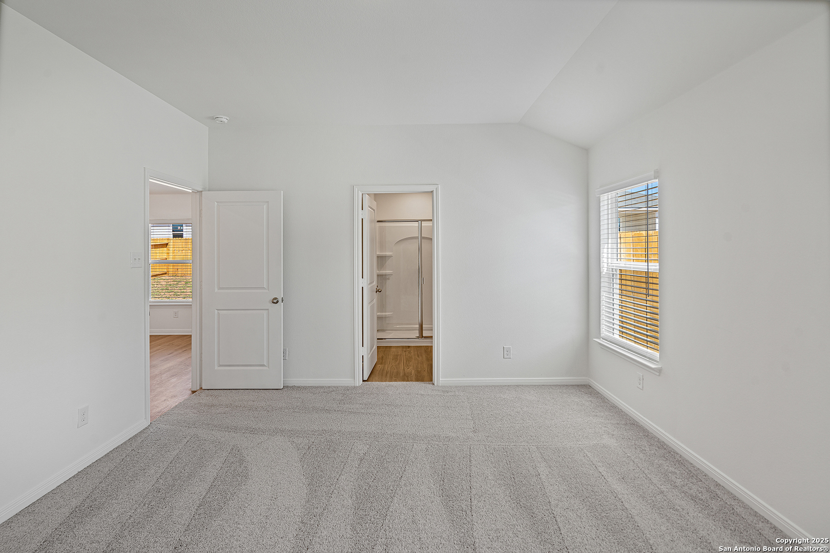 16148 Farmer Lytle, TX 78052 - Photo 13 of 33 an empty room with windows