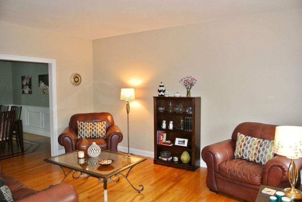 92 Robin Hill Road Groton, MA 01450 - Photo 13 of 30 a living room with furniture and a wooden floor