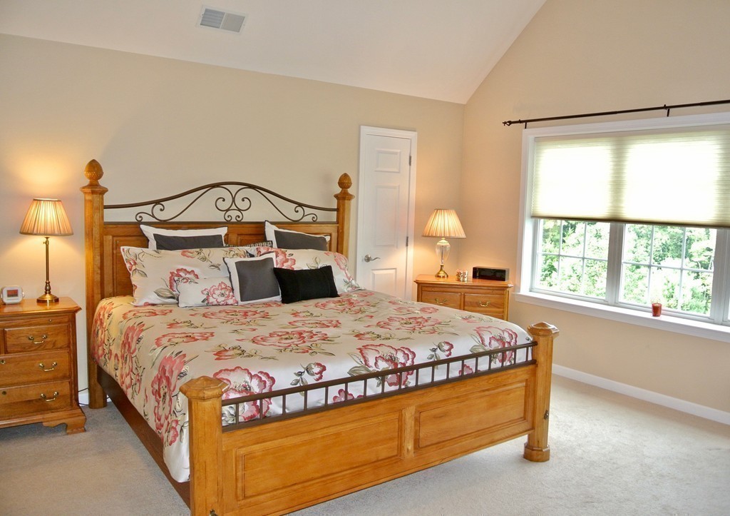 92 Robin Hill Road Groton, MA 01450 - Photo 19 of 30 a bedroom with a bed and window